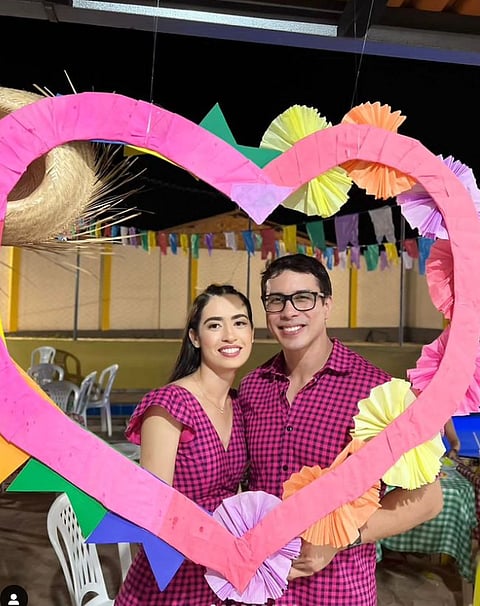 Ayres Sasaki with his wife, Mariana.